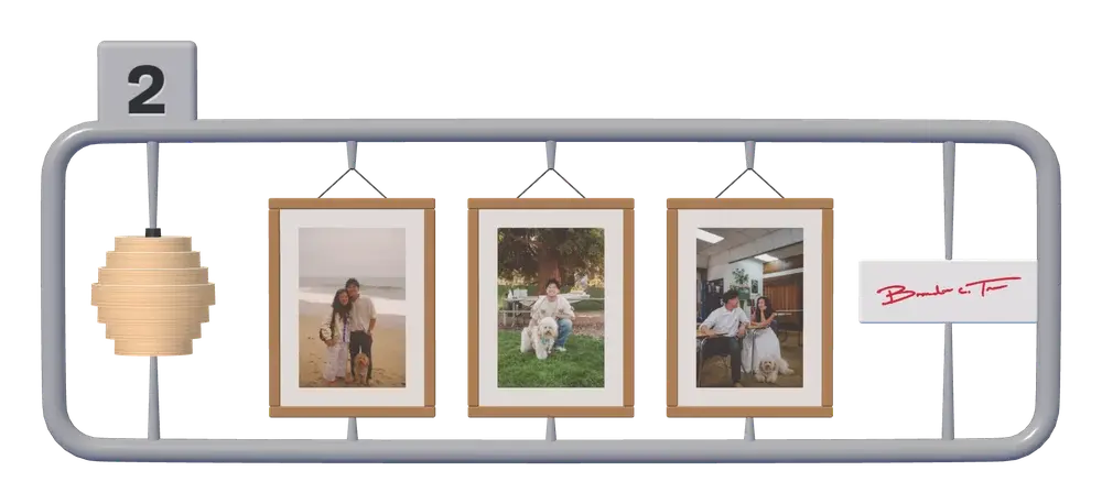 The second frame: my lamp's beehive shade, our three framed photos, and the tag with my autograph.
